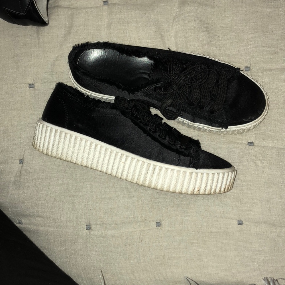 Black platform sneakers express